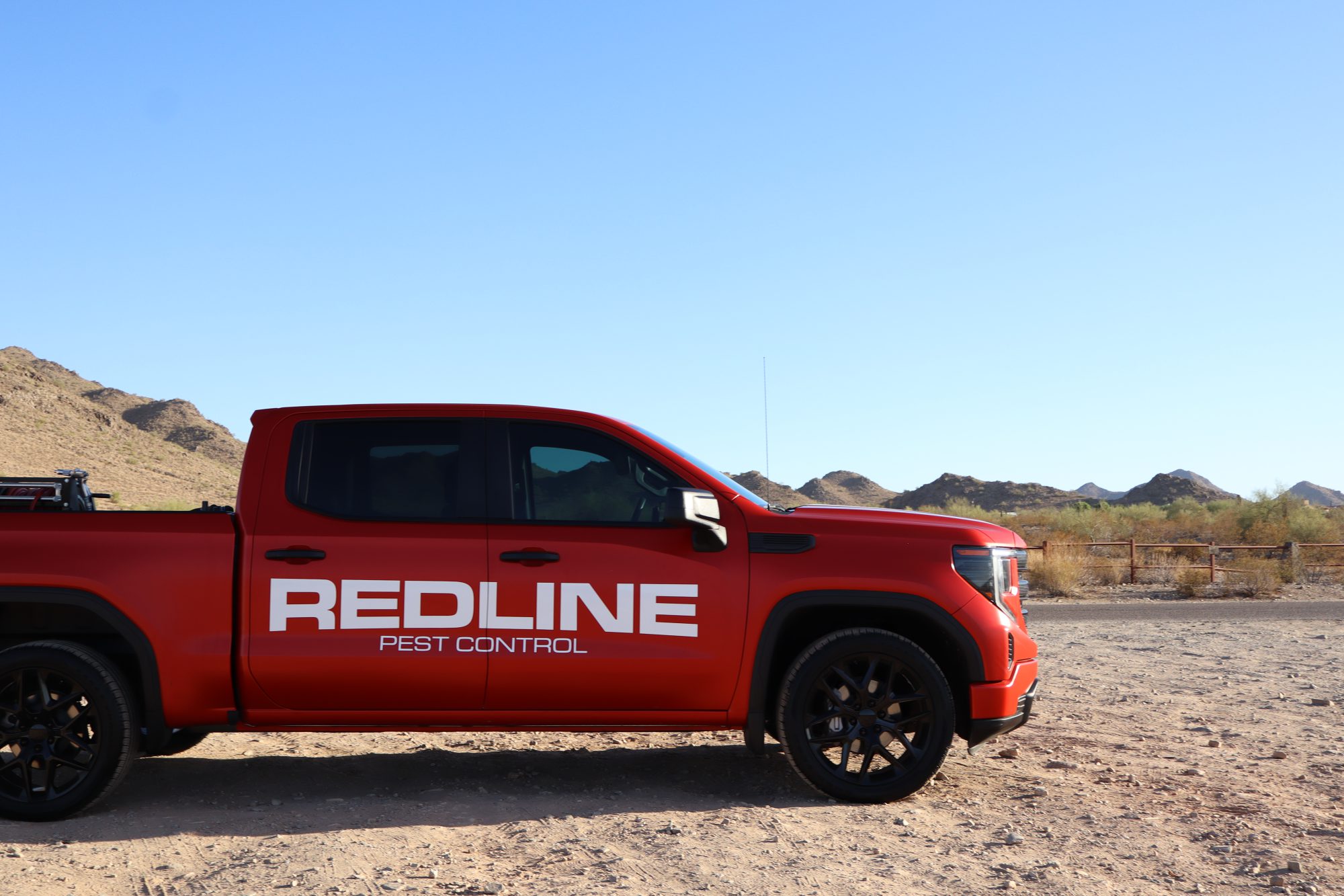 Redline Pest Control truck serving Surprise, AZ